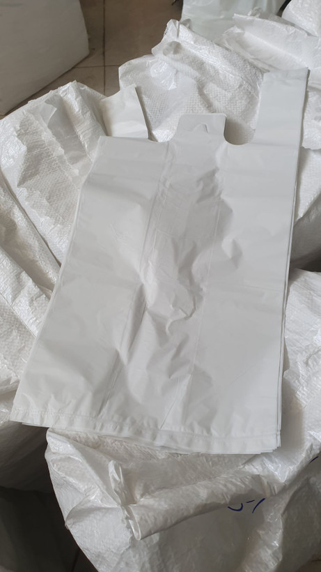 یک کیلوگرم نایلکس شیری (مشما) دسته دار رکابی